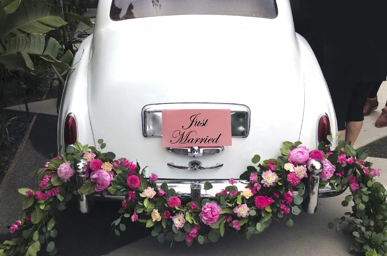 From outside of the white 1962 Rolls-Royce Silver Cloud II LWB From outside of the white 1962 Rolls-Royce Silver Cloud II LWB