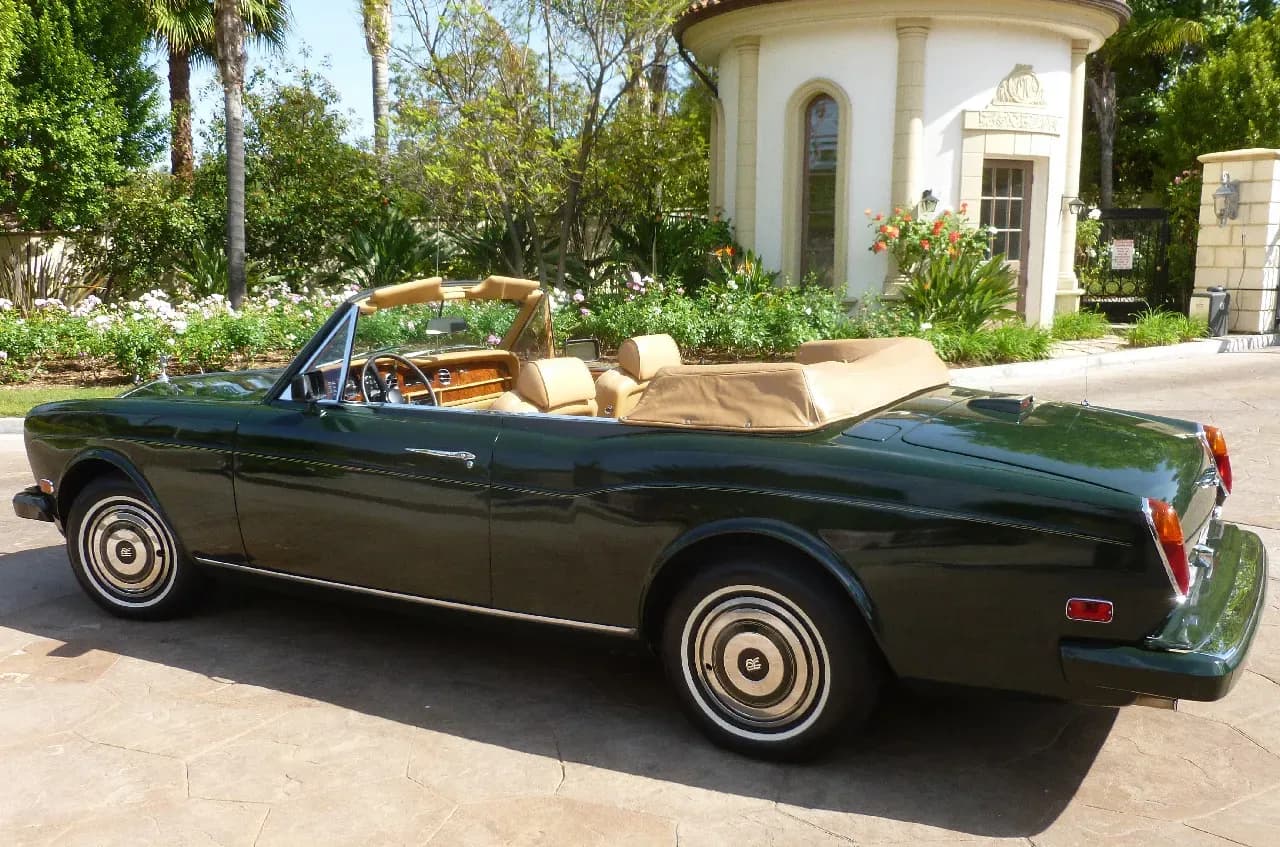 From outside of the green 1983 Rolls-Royce Corniche Convertible, showing convertible roof From outside of the green 1983 Rolls-Royce Corniche Convertible, showing convertible roof