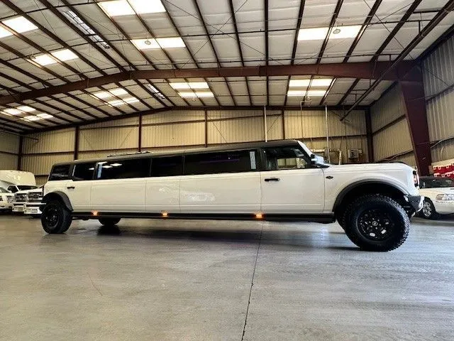 13 Passenger Bronco Limousine with Jet Door for limo rental in Visalia, CA