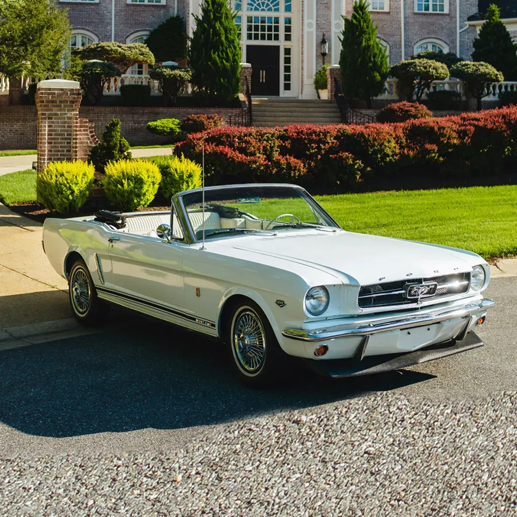 1965 White Ford Mustang GT Convertible for sports car rental