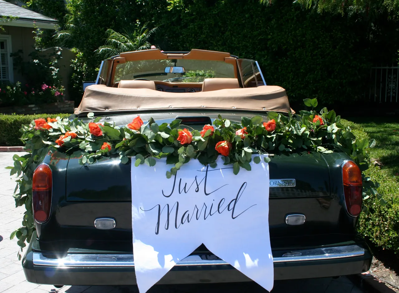 Green 1983 Rolls-Royce Corniche Convertible exterior with convertible roof, photo 7 for exotic and luxury car rental in Tarzana, CA