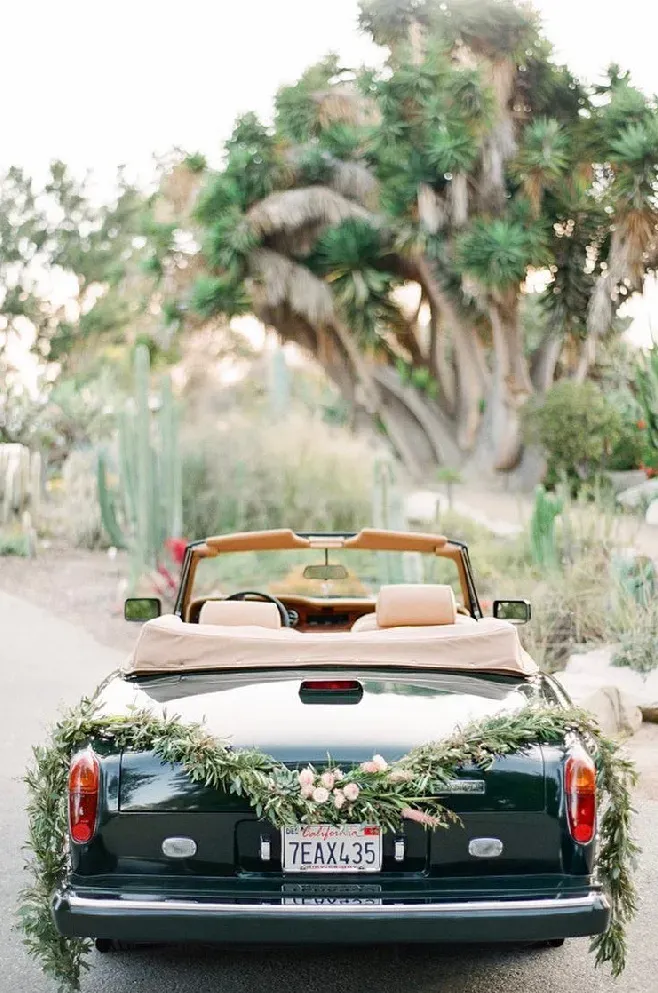 Green 1983 Rolls-Royce Corniche Convertible exterior with convertible roof, photo 10 for exotic and luxury car rental in Tarzana, CA