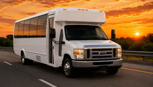 The white 20 Passenger Party Bus, ready to rent