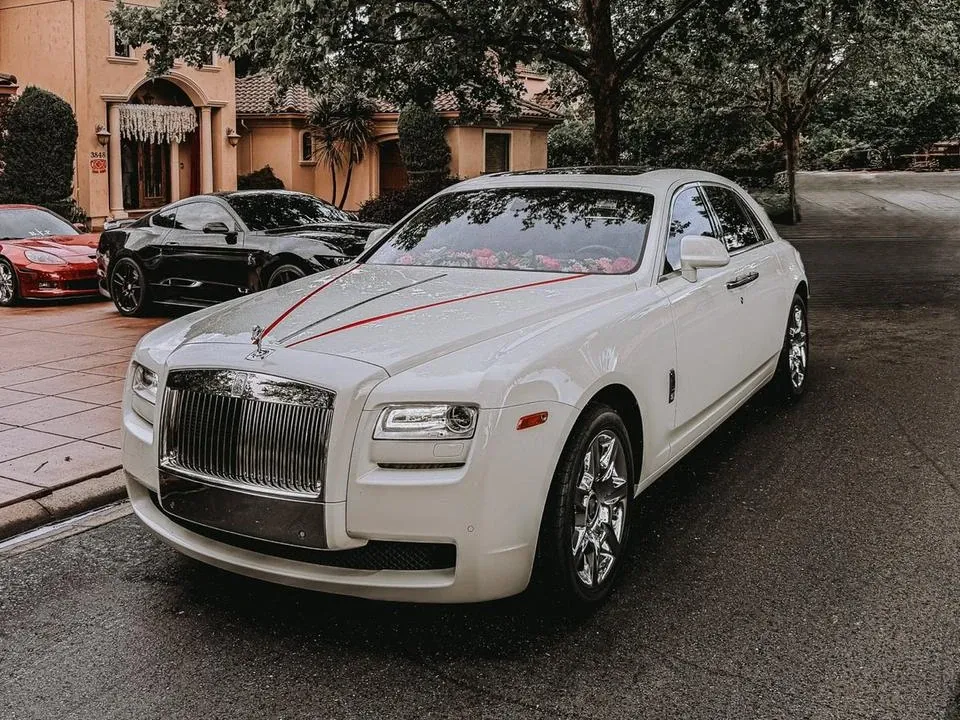 The white 2015 Rolls-Royce Ghost, ready to rent