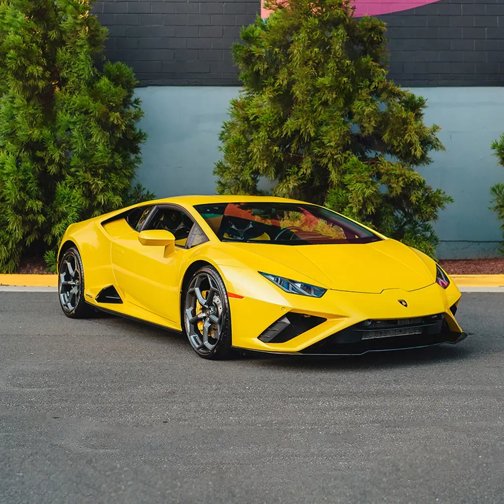 Gold 2022 Lamborghini Huracan EVO Giallo Orion for exotic and luxury car rental