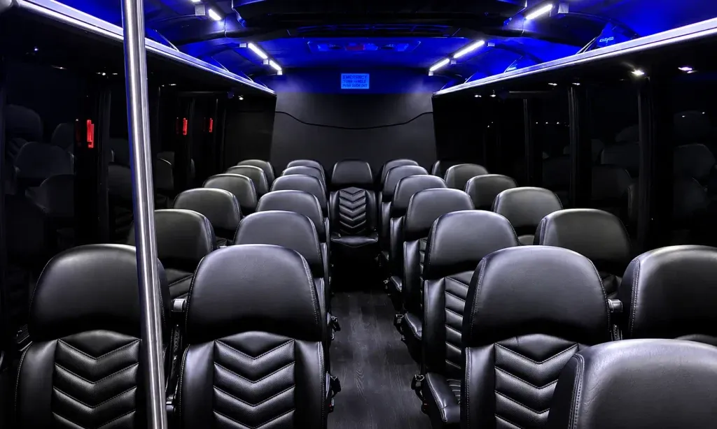 Black 27 Passenger Shuttle Bus for charter bus rental in Angwin, CA