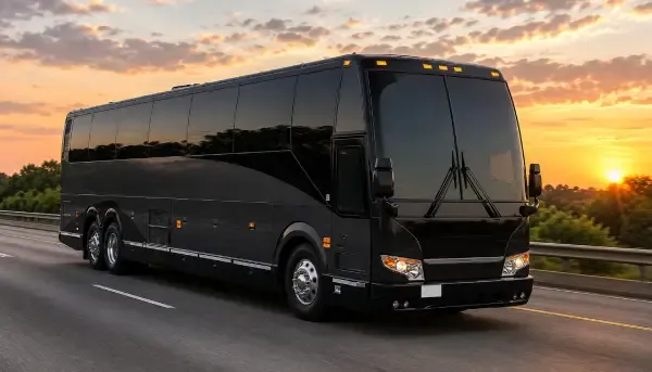 The black 55 Passenger Motor Coach, ready to rent