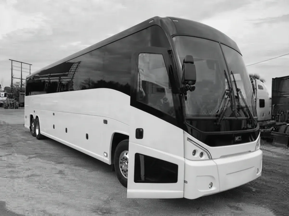 56 Passenger Luxury Motor Coach The white 56 Passenger Luxury Motor Coach, ready to rent