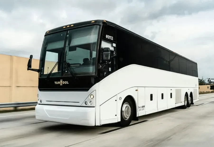 White 57 Passenger Van Hool for charter bus rental