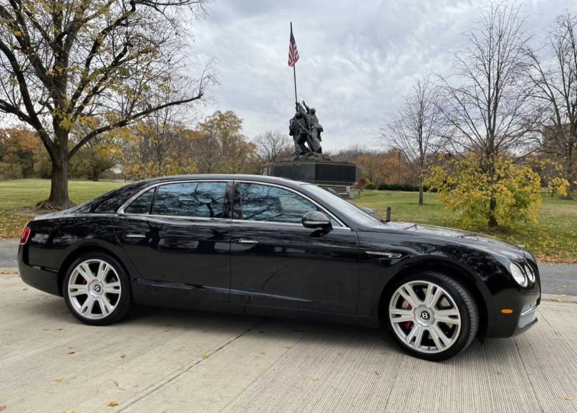 Black Bentley Flying Spur exterior, photo 3 for wedding car rental