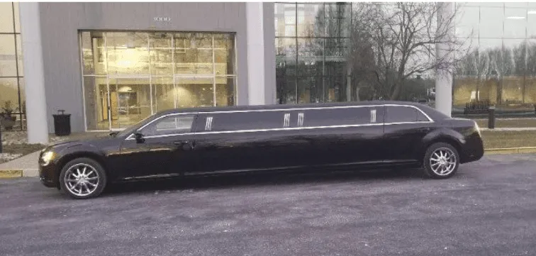 The white Black Chrysler Limousine, showing tinted windows