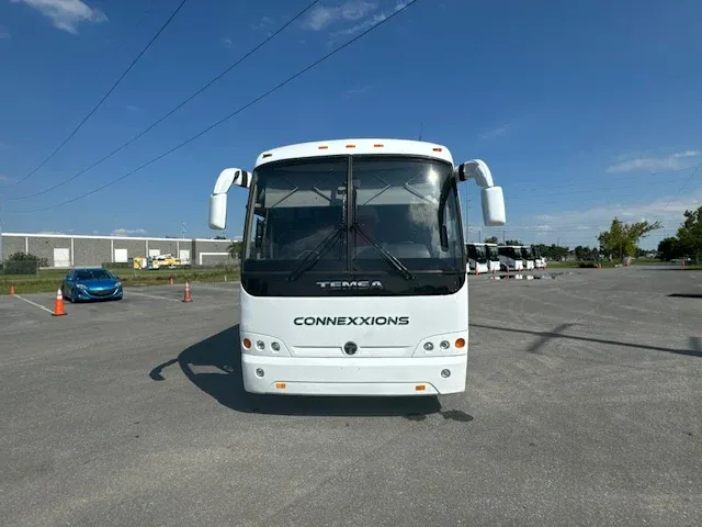 White 40 Passenger Charter Bus for charter bus rental in Orlando, FL