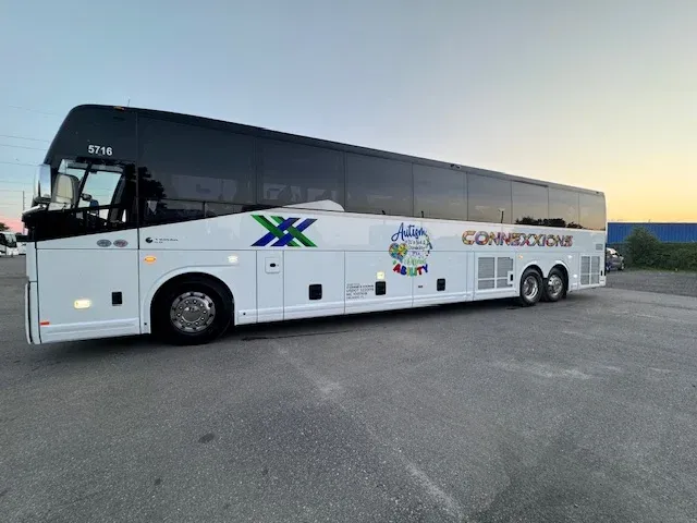 White 56 Passenger Charter Bus for charter bus rental