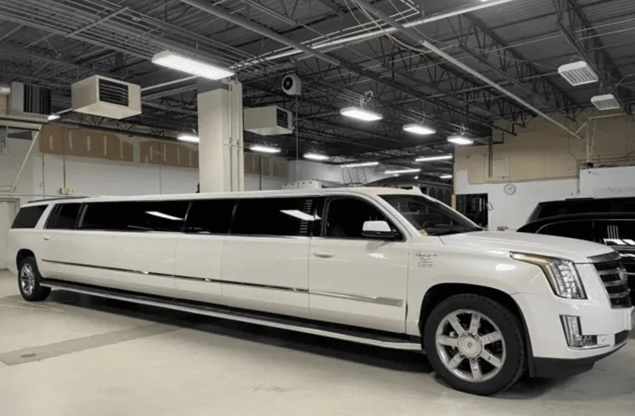 White Cadillac Escalade Limousine with tinted windows for limo rental in Atlanta, GA