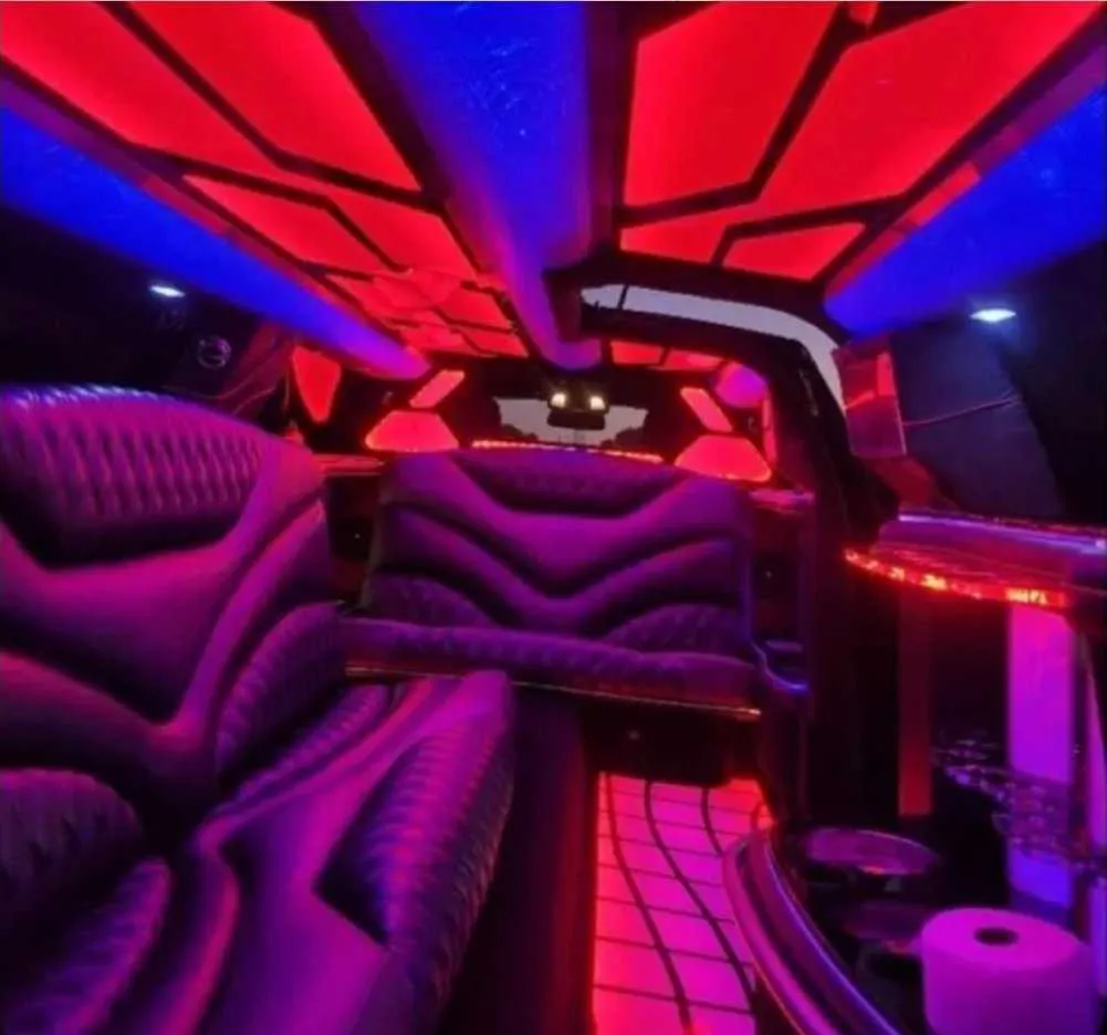 Charger Limousine interior with LED accent lighting, LED ceiling lighting and lit dance floor for limo rental in Schertz, TX