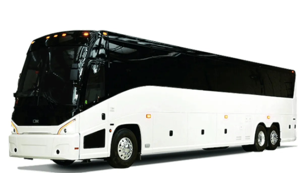 The white 56 Passenger Charter Bus, ready to rent