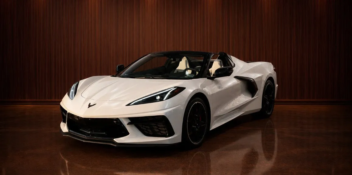 White Chevrolet Corvette with convertible roof for sports car rental