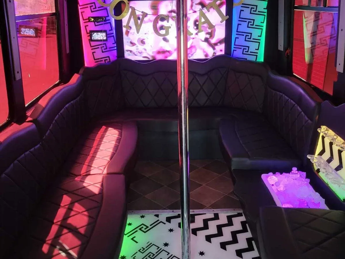 The white Chevrolet Party Bus, shot 3