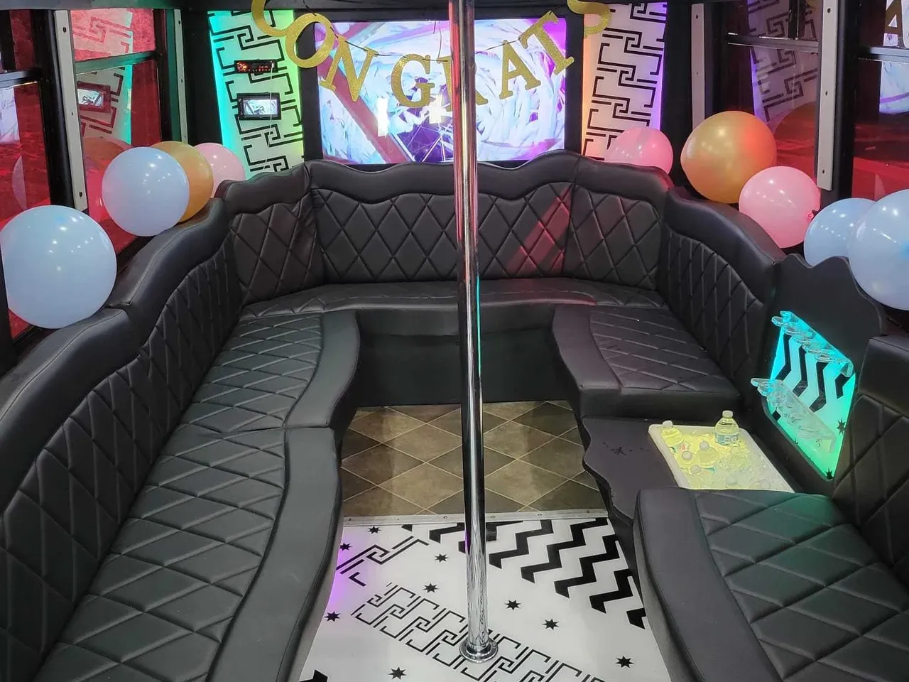 The white Chevrolet Party Bus, shot 2