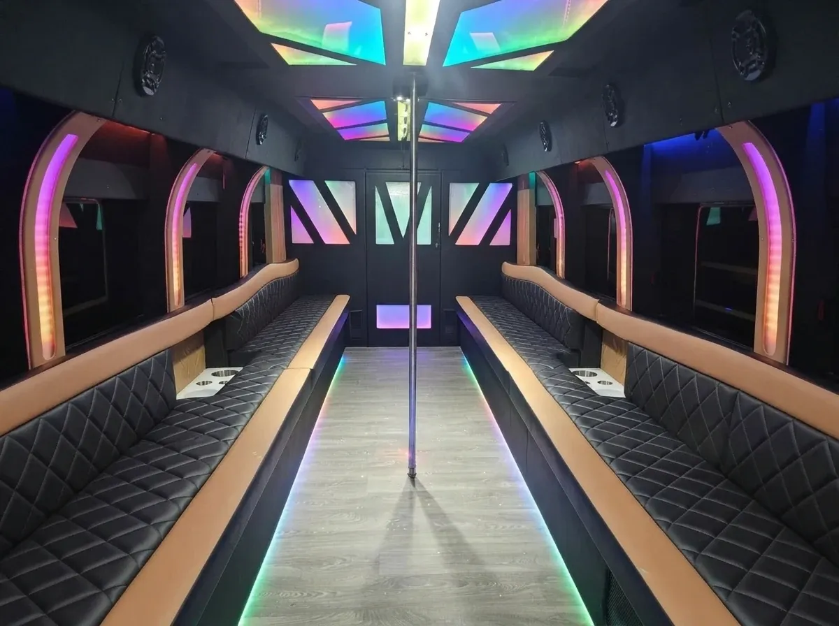 The white D-Lux Party Bus, ready to rent