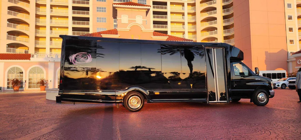 Black 2019 Luxury Party Bus (Dark Shadow) exterior with tinted windows for party bus rental