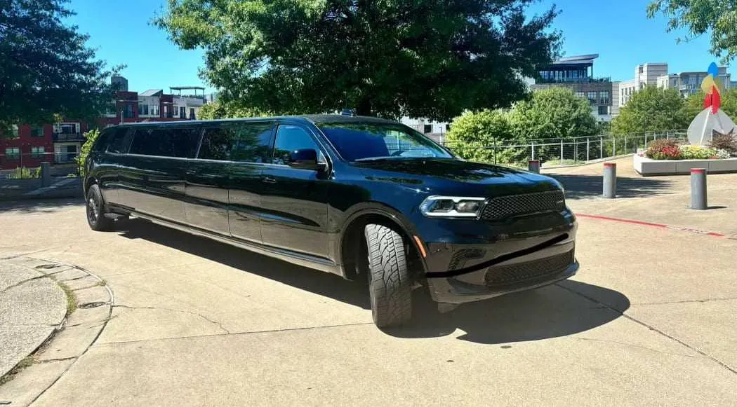 Black Dodge Durango Stretch Limousine with tinted windows for limo rental
