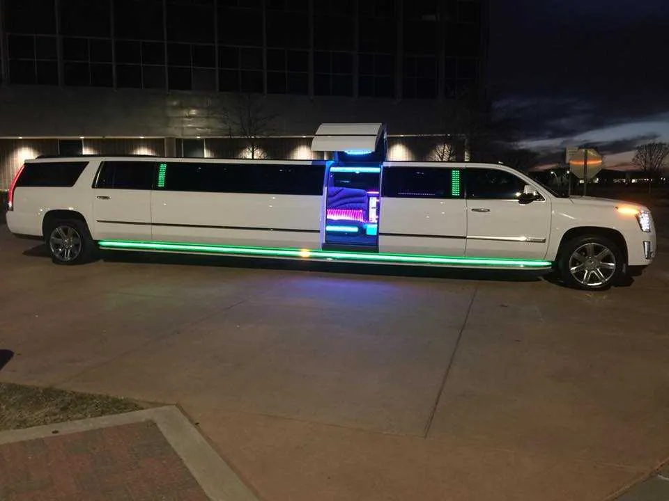 White Escalade Limo for limo rental in Paris, TX