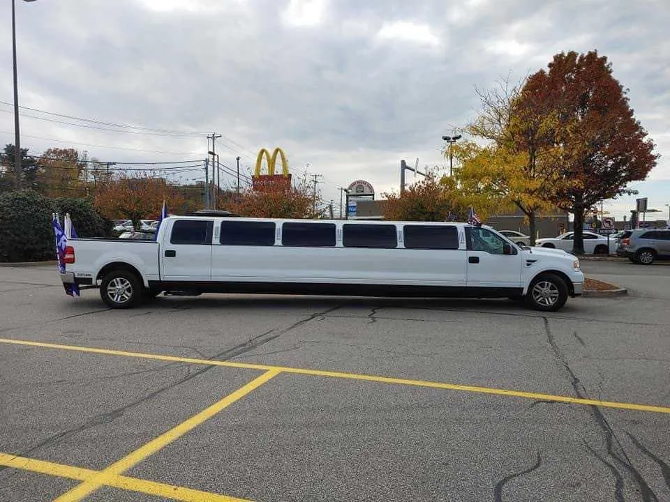 White F150 Limousine with tinted windows for limo rental