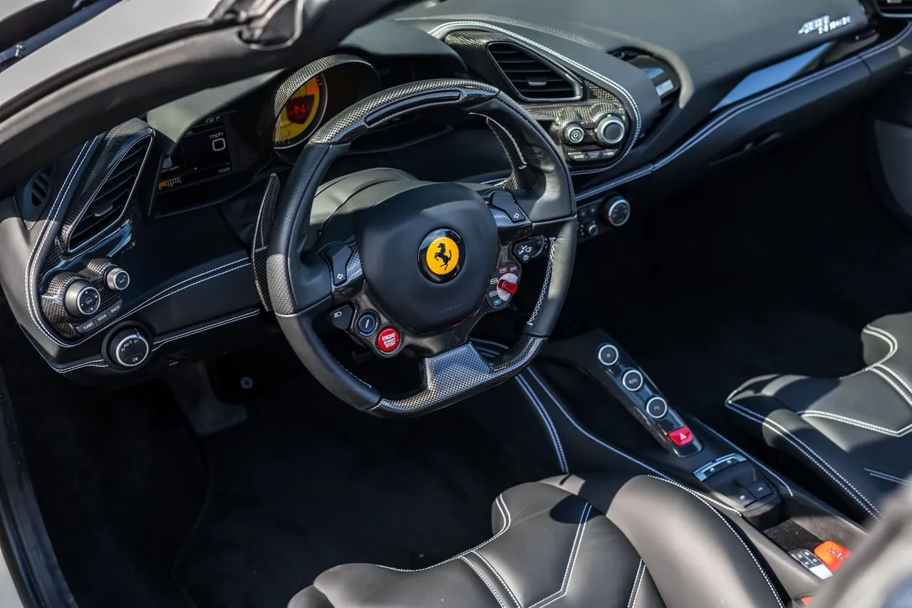 The white Ferrari 488 Spider, shot 6