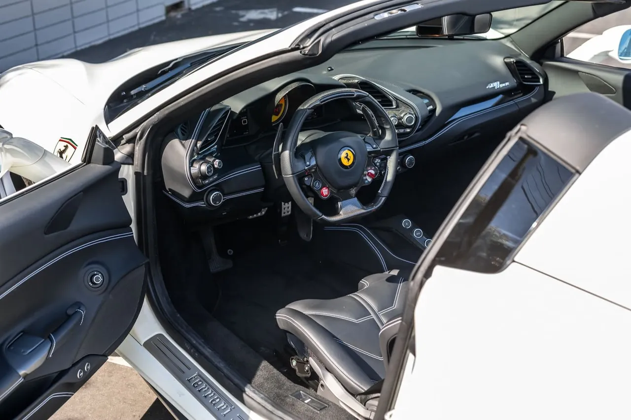 The white Ferrari 488 Spider, shot 9