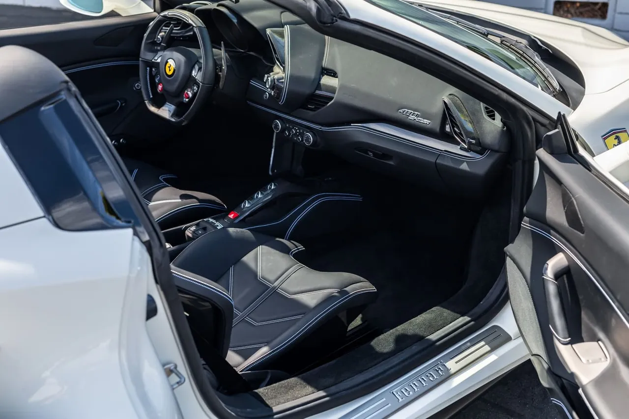 The white Ferrari 488 Spider, shot 5