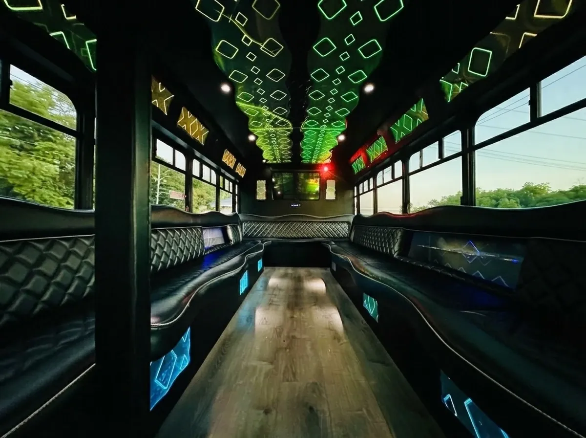 The white Ford E-450 Series Party Bus, shot 7