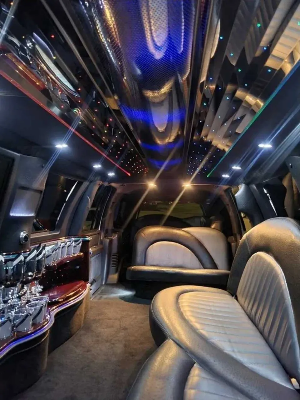 Ford Expedition Limousine interior with LED accent lighting, starlight or fiber-optic ceiling and mirrored ceiling, photo 3 for limo rental in Schertz, TX