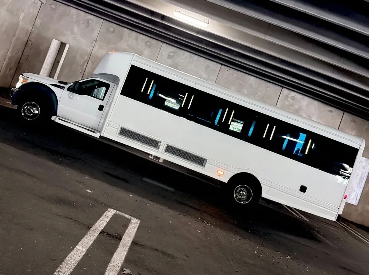 The white Ford F-550 Party Bus, shot 9