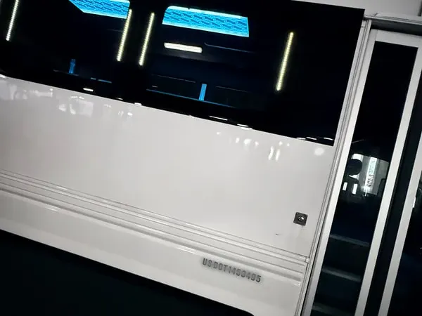 The white Ford F-550 Party Bus, shot 3