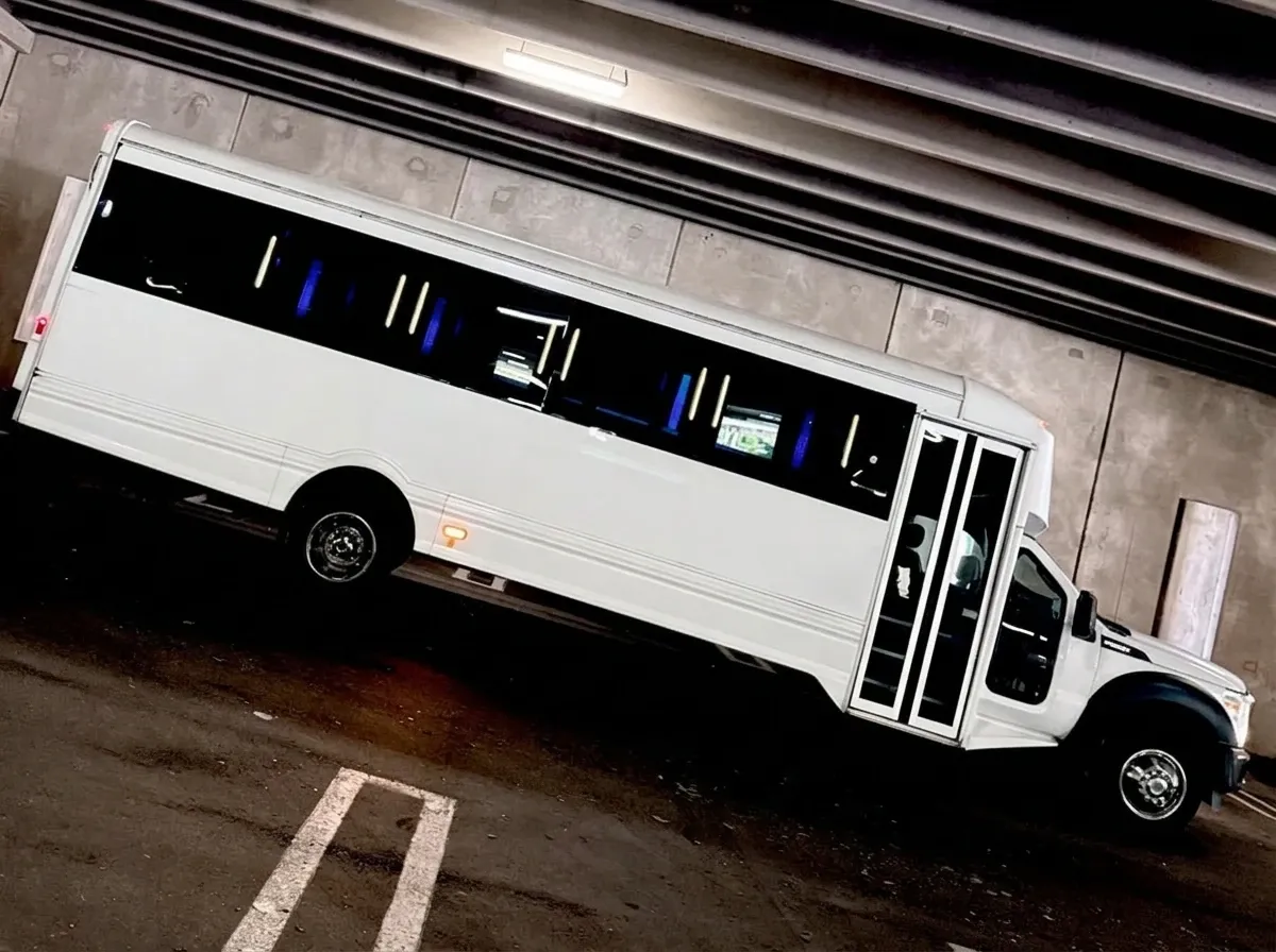 The white Ford F-550 Party Bus, shot 7