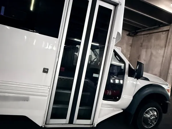 The white Ford F-550 Party Bus, shot 11