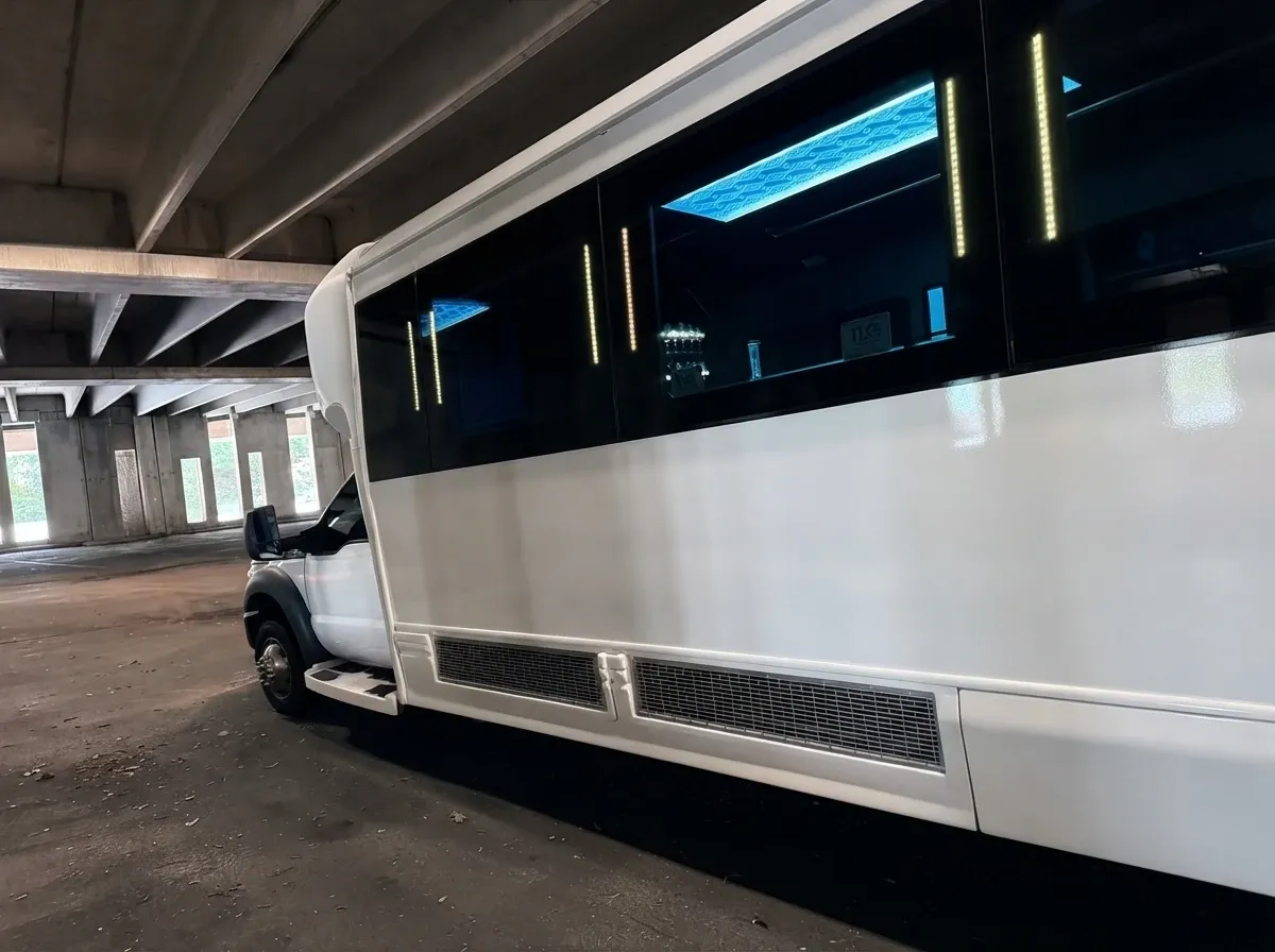 The white Ford F-550 Party Bus, shot 4
