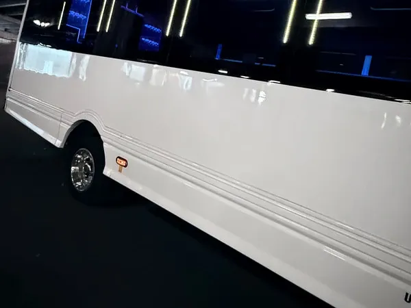 The white Ford F-550 Party Bus, shot 8