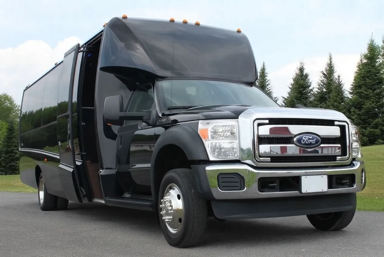 The black Ford F550 Party Bus Limousine, ready to rent