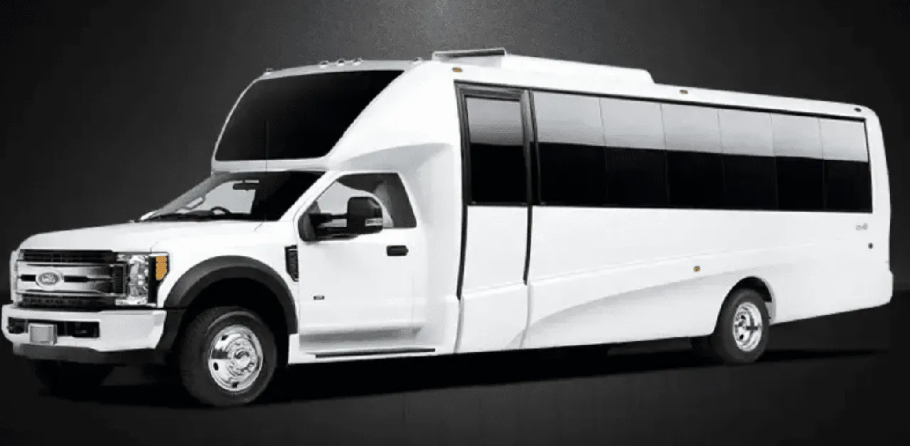 White Ford Mini-Coach for charter bus rental in Ballico, CA
