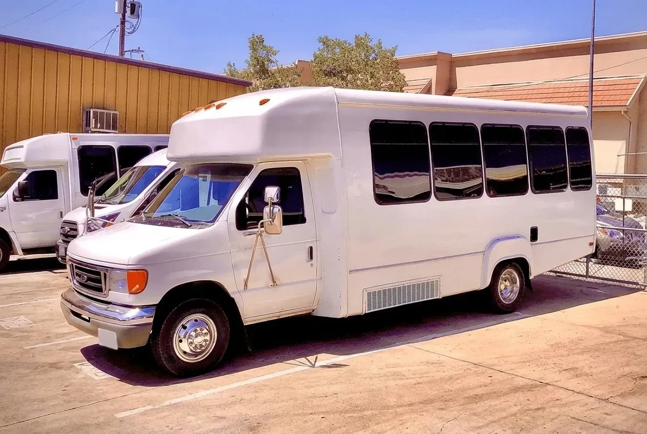 The white Limousine Party Bus, ready to rent