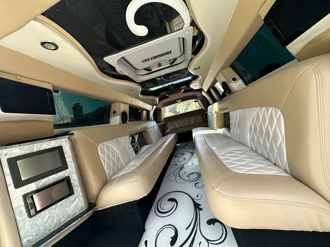 18 Passenger Lincoln Navigator interior with TV screens for limo rental