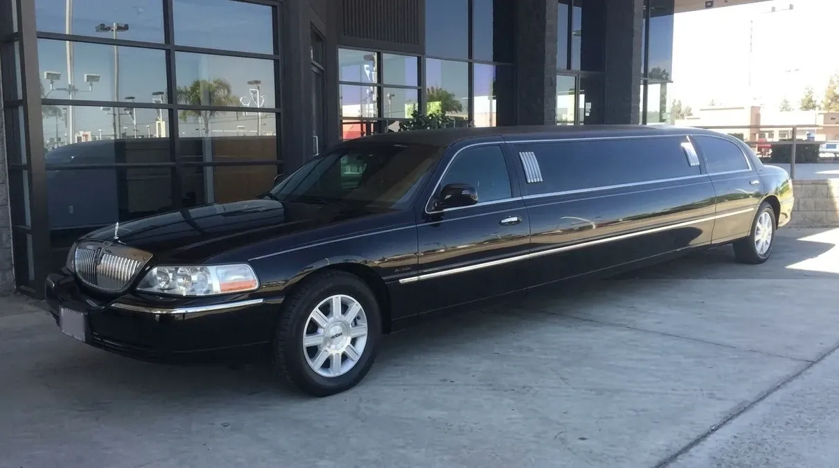 The black Lincoln Town Car Limousine, ready to rent