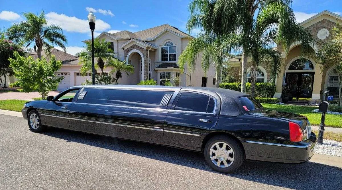 Black Lincoln Town Car Limousine with tinted windows for limo rental