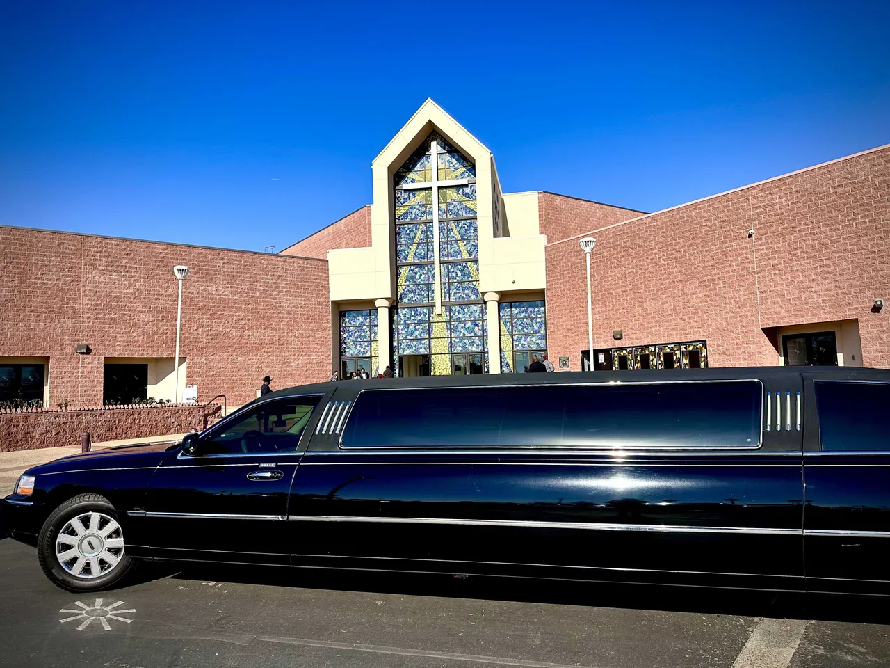 Black Lincoln Town Car Limousine exterior with tinted windows for limo rental in Hickman, CA