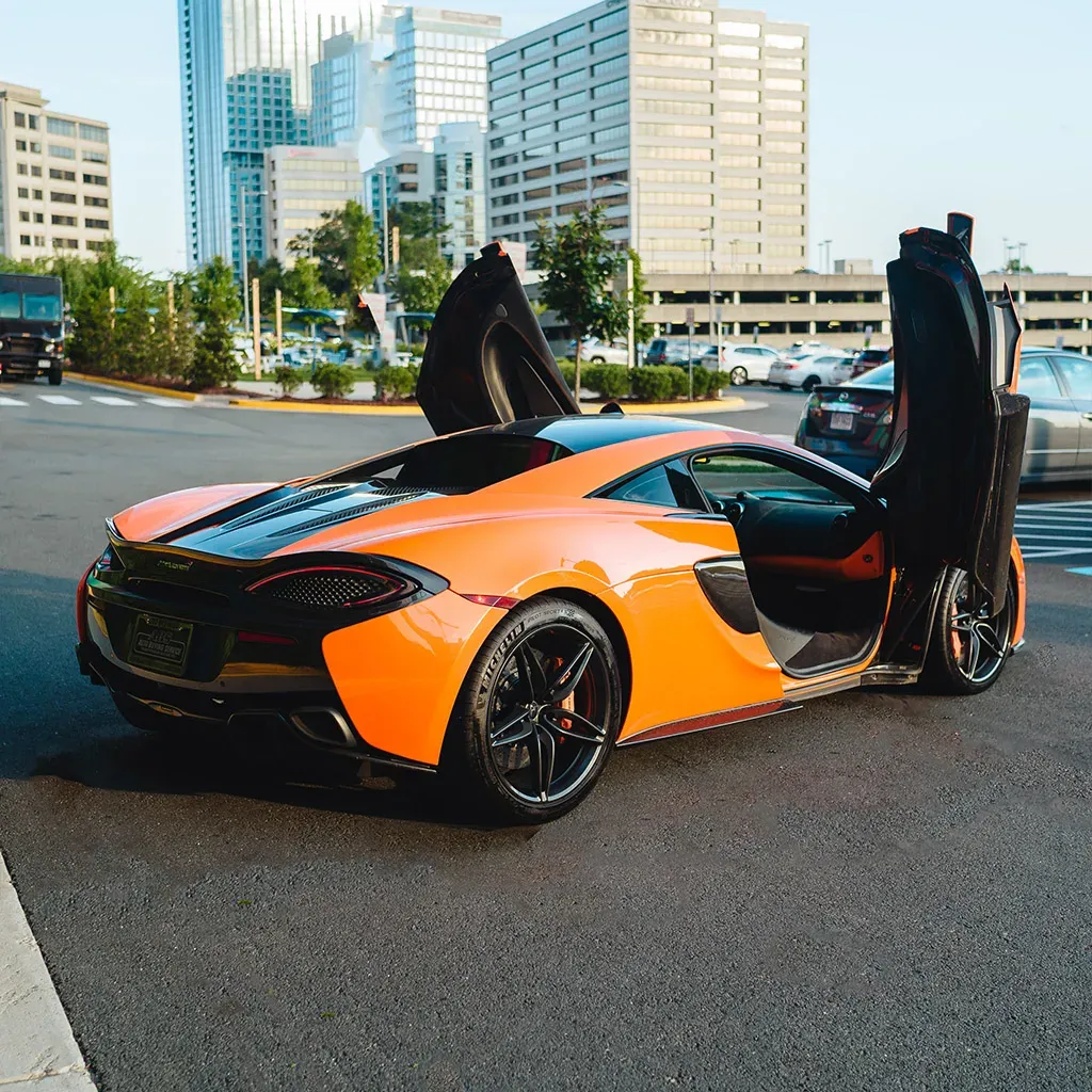 Orange McLaren 570S Ventura, photo 3 for sports car rental