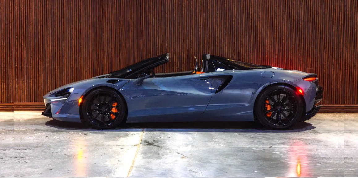 Gray McLaren Artura exterior with convertible roof for sports car rental
