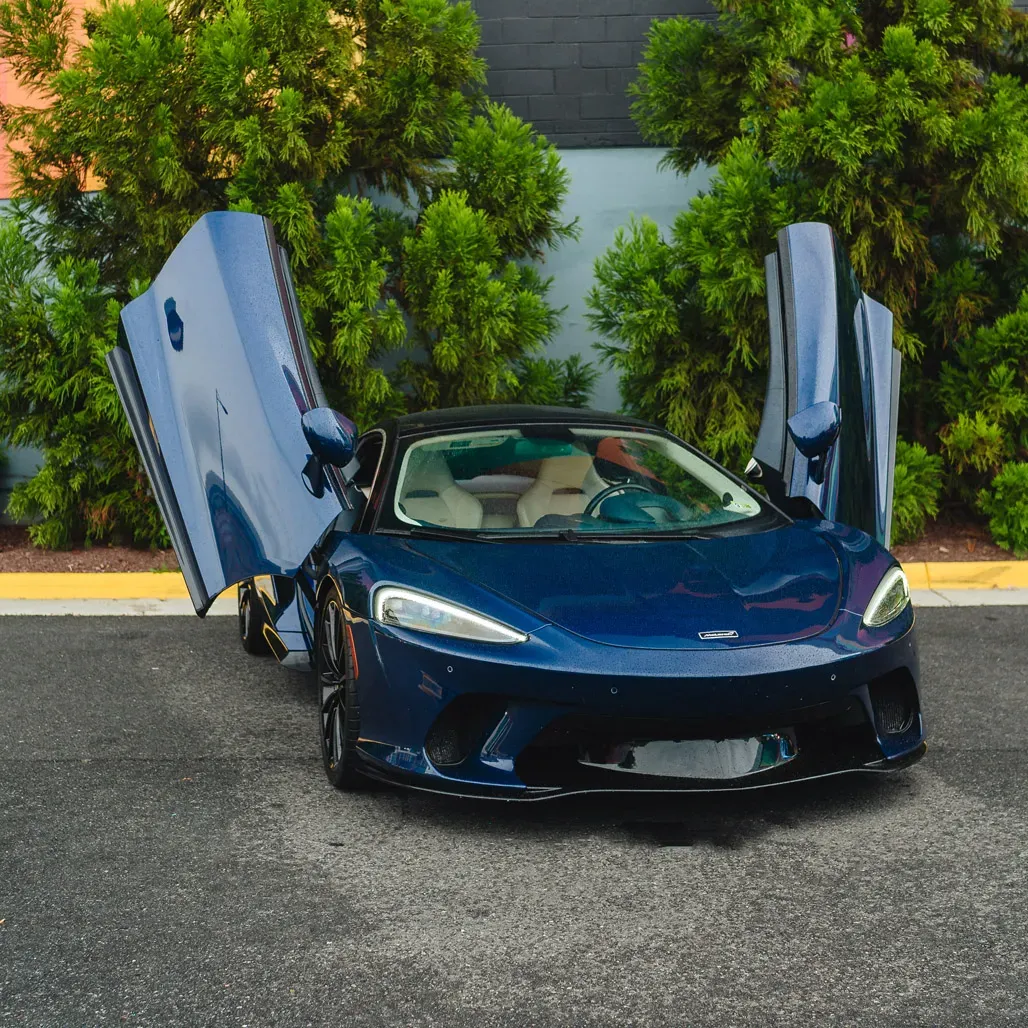 McLaren GT Aurora blue for exotic and luxury car rental