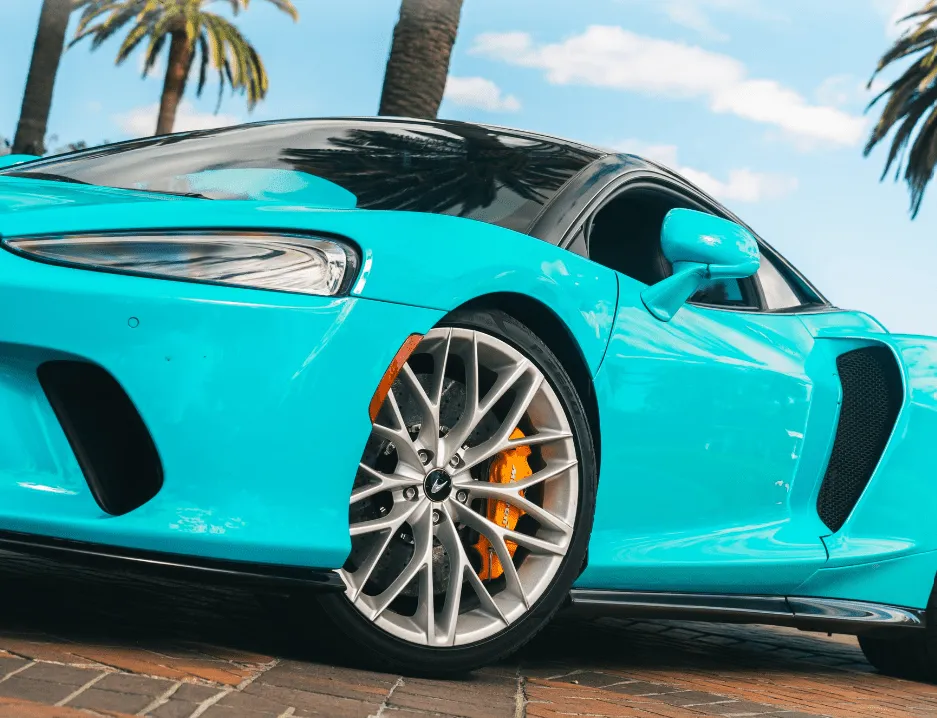 Blue McLaren GT for exotic and luxury car rental